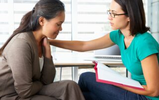 addiction counselor and patient