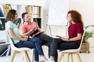 group-people-discussing-study-room-while-holding-digital-tablet-clipboard group-people-discussing-study-room-while-holding-digital-tablet-clipboard