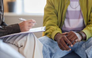 substance abuse counselor with patient